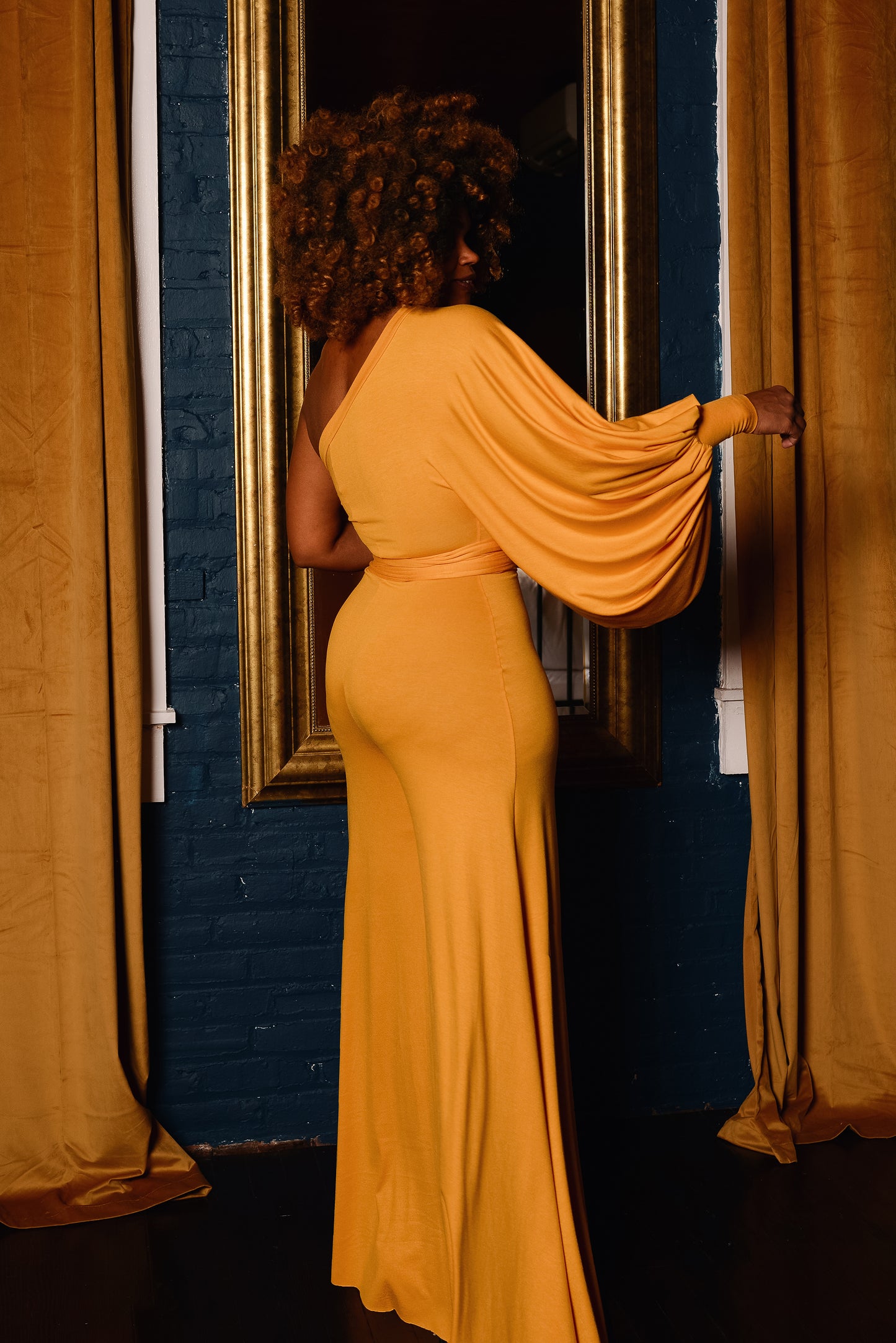 bishop one-shoulder jumper