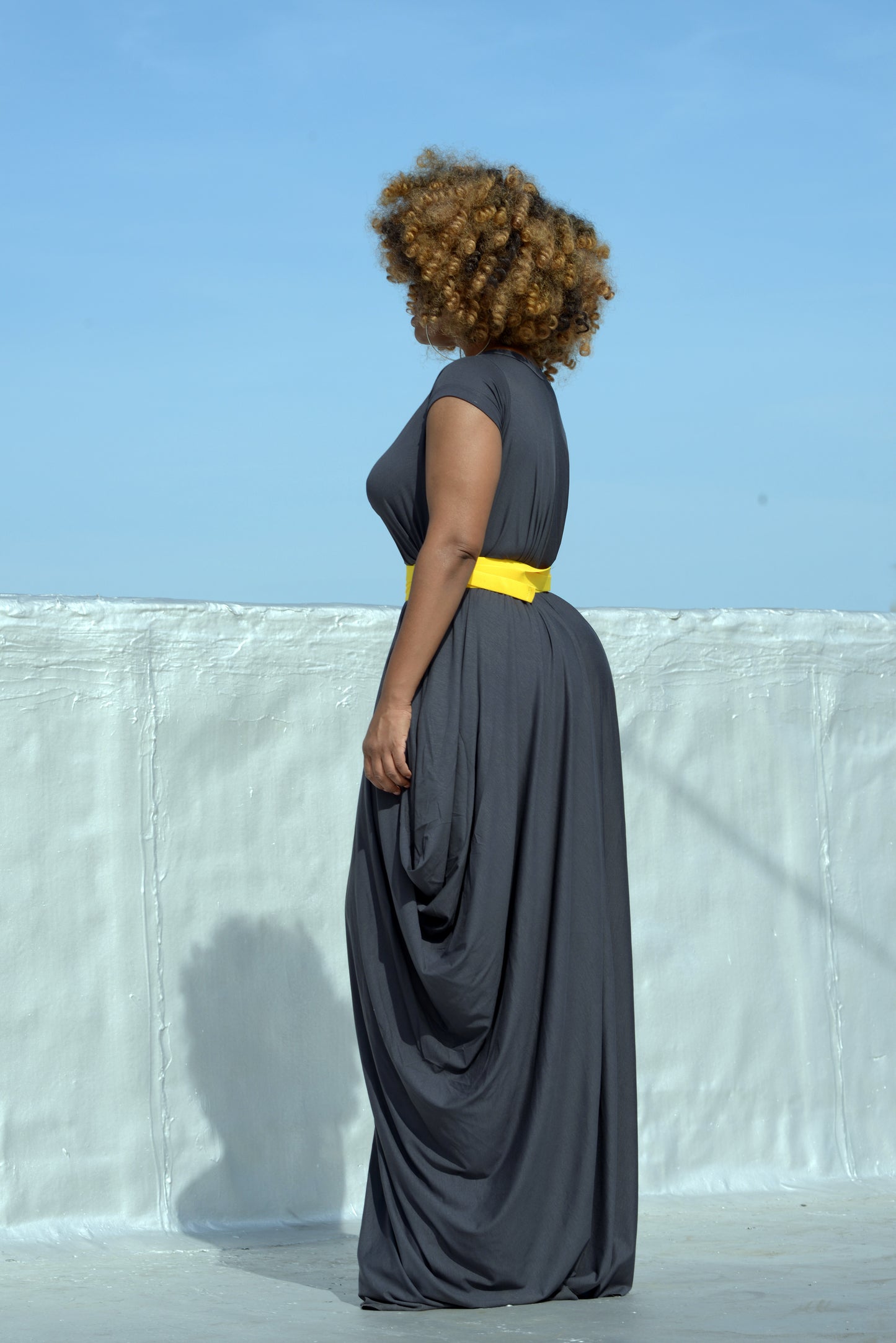 charcoal drape with elastic yellow wrap belt