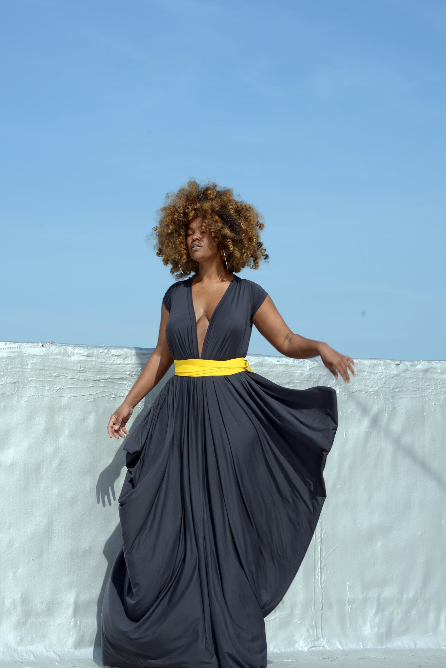 charcoal drape with elastic yellow wrap belt